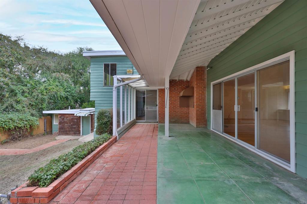 5930 Waverly Avenue La Jolla, CA 92037 - Photo 52 of 61 a view of house with backyard and garden