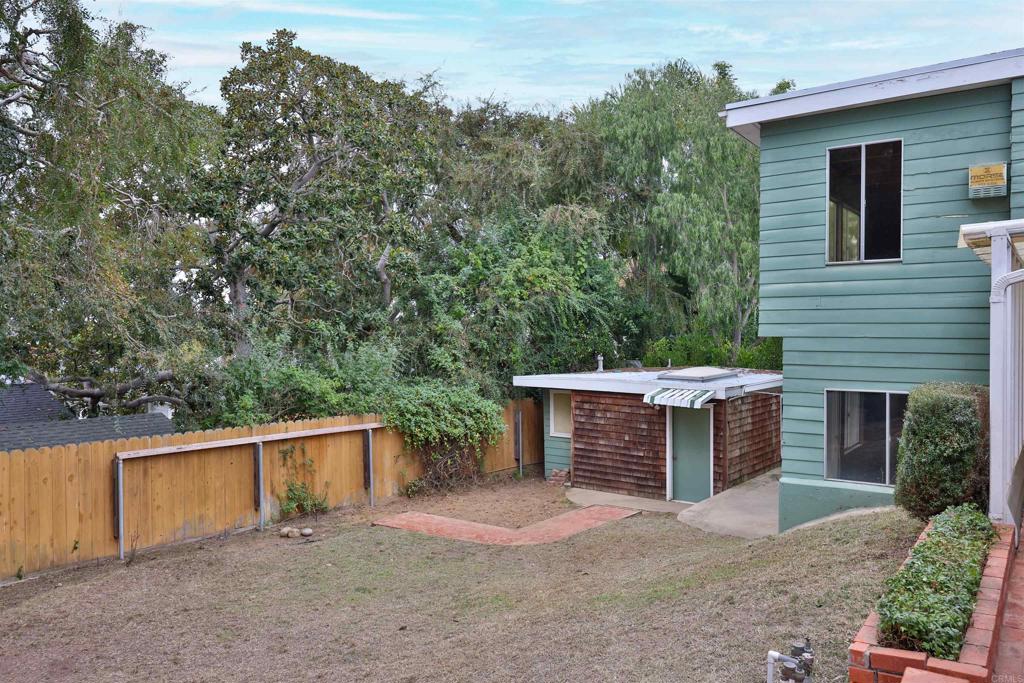 5930 Waverly Avenue La Jolla, CA 92037 - Photo 54 of 61 a front view of house with yard and trees in the background