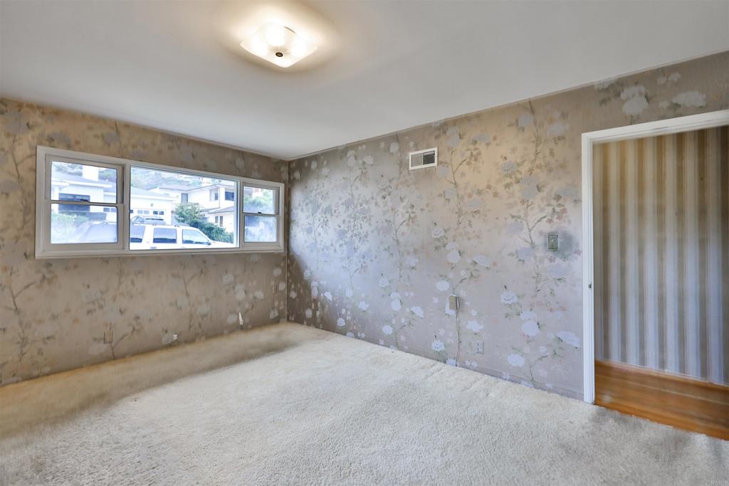 5930 Waverly Avenue La Jolla, CA 92037 - Photo 6 of 61 en empty room with windows