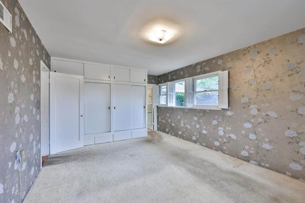 5930 Waverly Avenue La Jolla, CA 92037 - Photo 7 of 61 a view of an empty room with a window