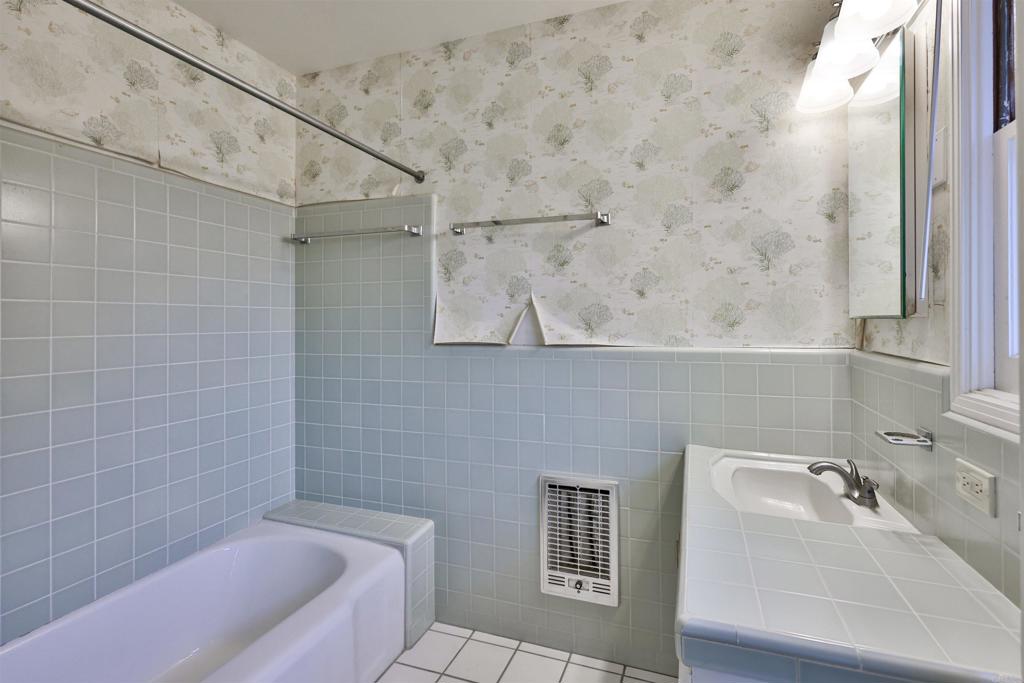 5930 Waverly Avenue La Jolla, CA 92037 - Photo 9 of 61 a bathroom with a sink and bathtub