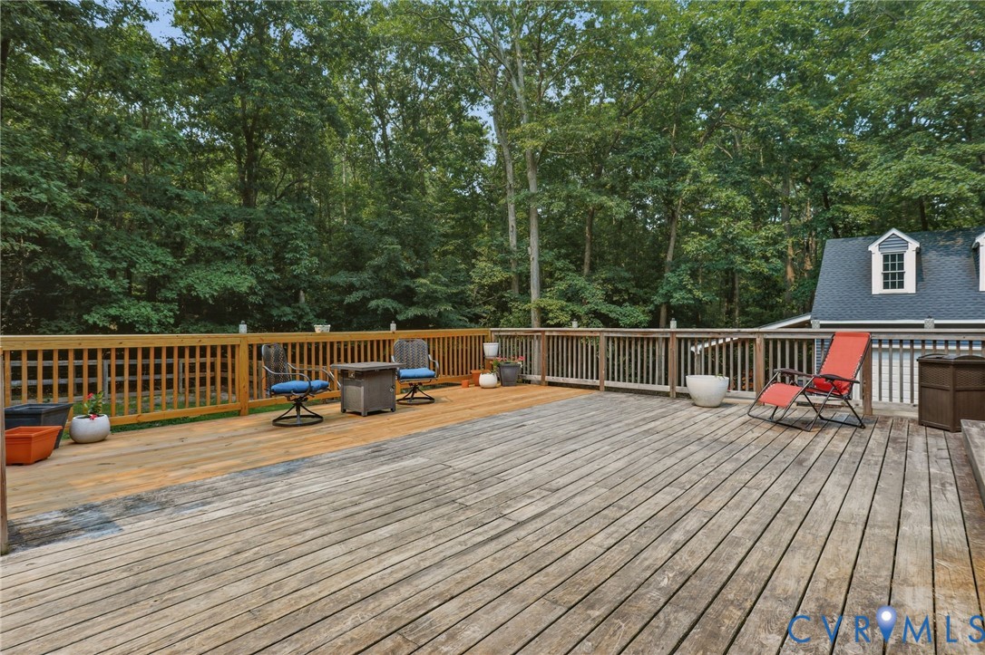 13232 Singer Road Midlothian, VA 23112 - Photo 34 of 44 Expansive wood deck with offers ample outdoor livi