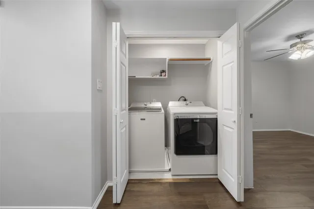 a utility room with washing machine