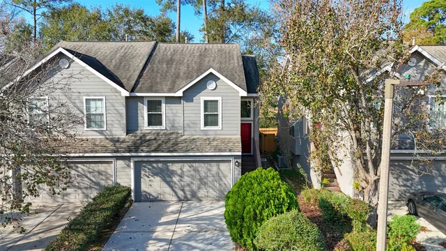 a house with trees in the background