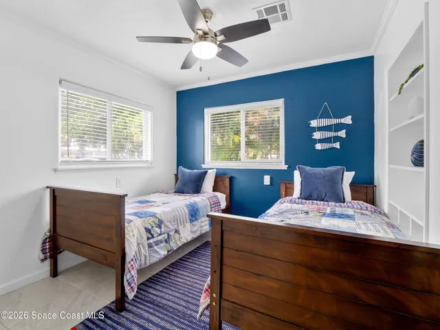a kitchen with a stove a sink and a refrigerator