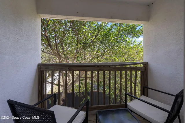 a view of house with outdoor space and swimming pool