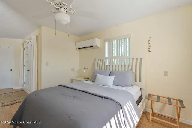 a bathroom with a double vanity sink mirror and shower