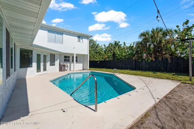 a view of a city with an ocean view