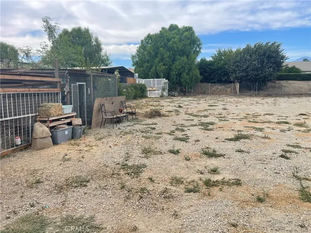 a backyard of a house with seating space