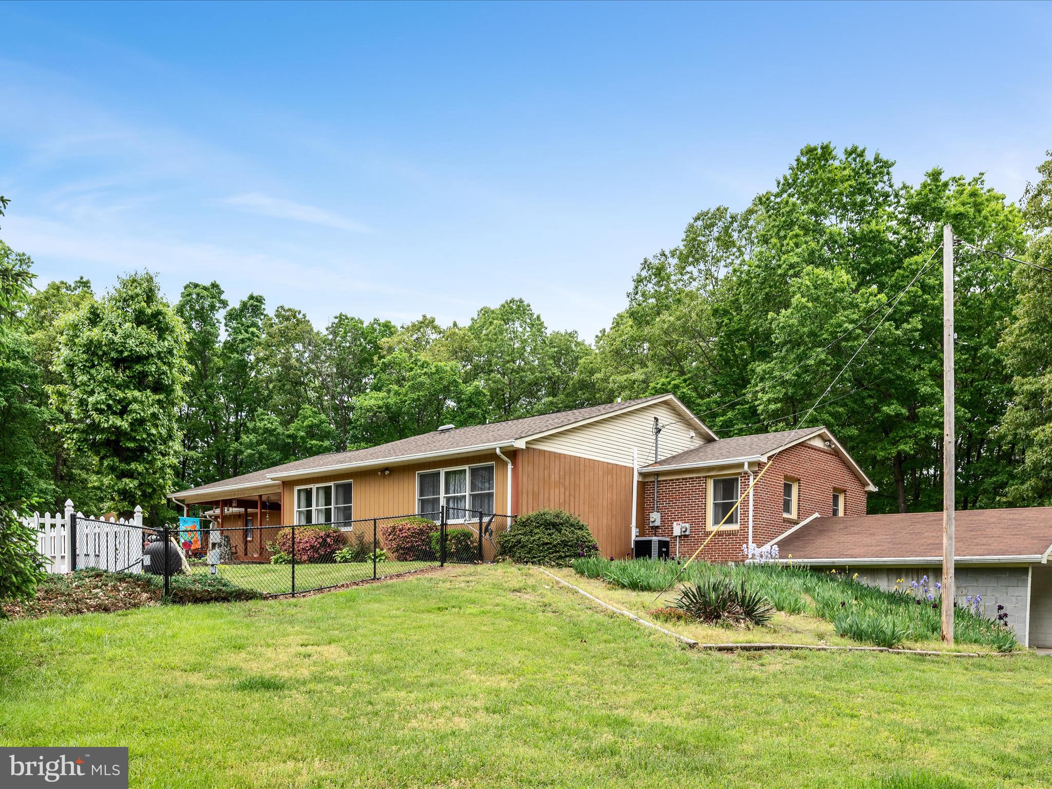 281 Light Road Winchester, VA 22603 - Photo 1 of 54 rear yard view showing carport and fenced pool