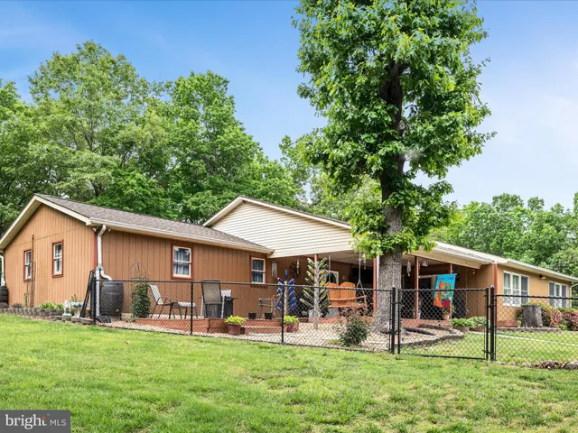a garden view with a seating space