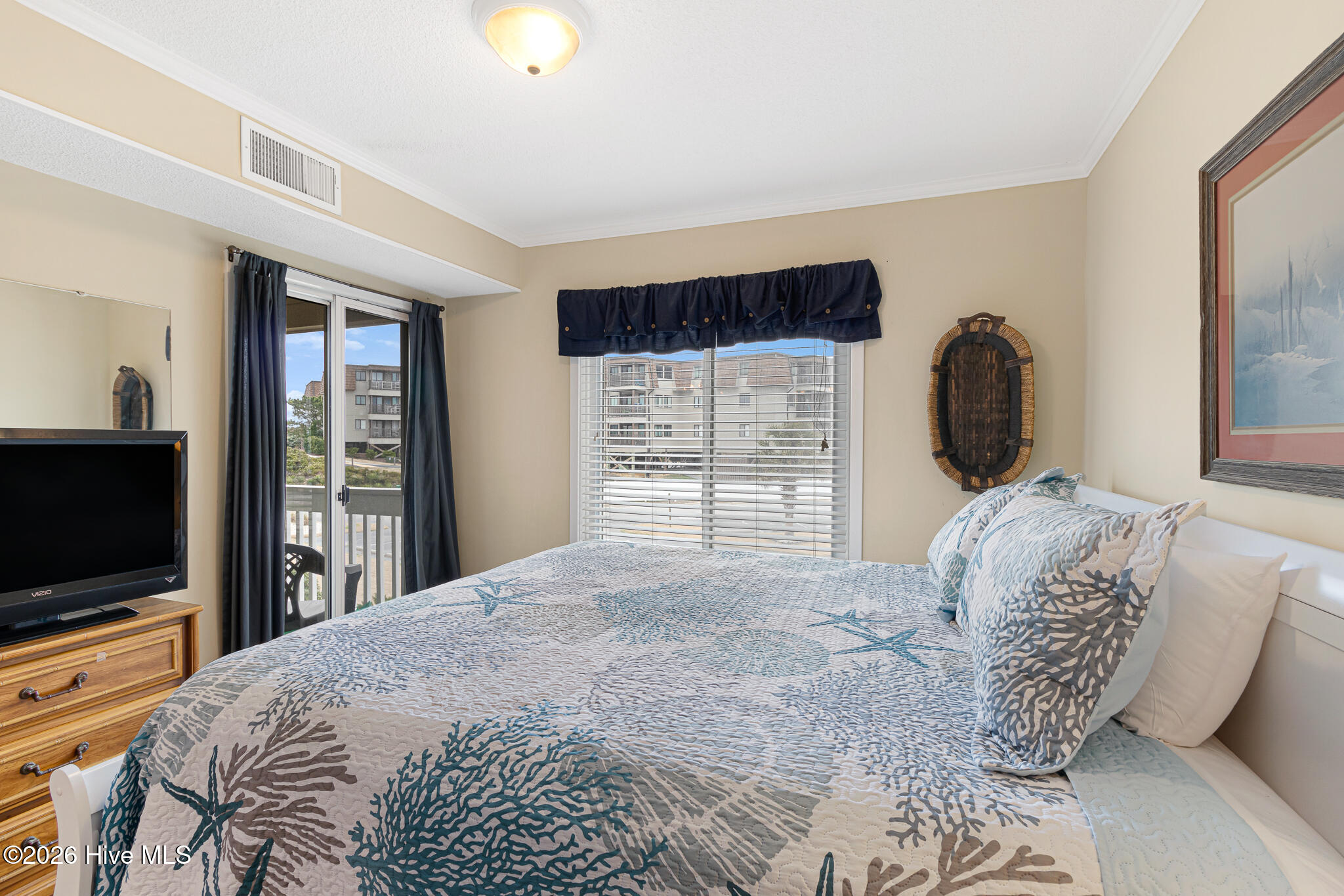 1904 East Fort Macon Road, Unit 156 Atlantic Beach, NC 28512 - Photo 19 of 49 Primary Bedroom with Balcony Access