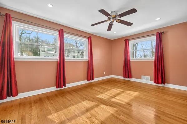 a bed room with a bed and a window