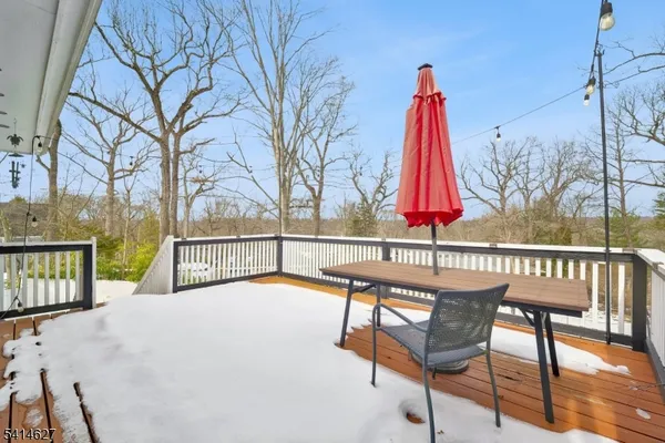a view of a chairs and table in the terrace