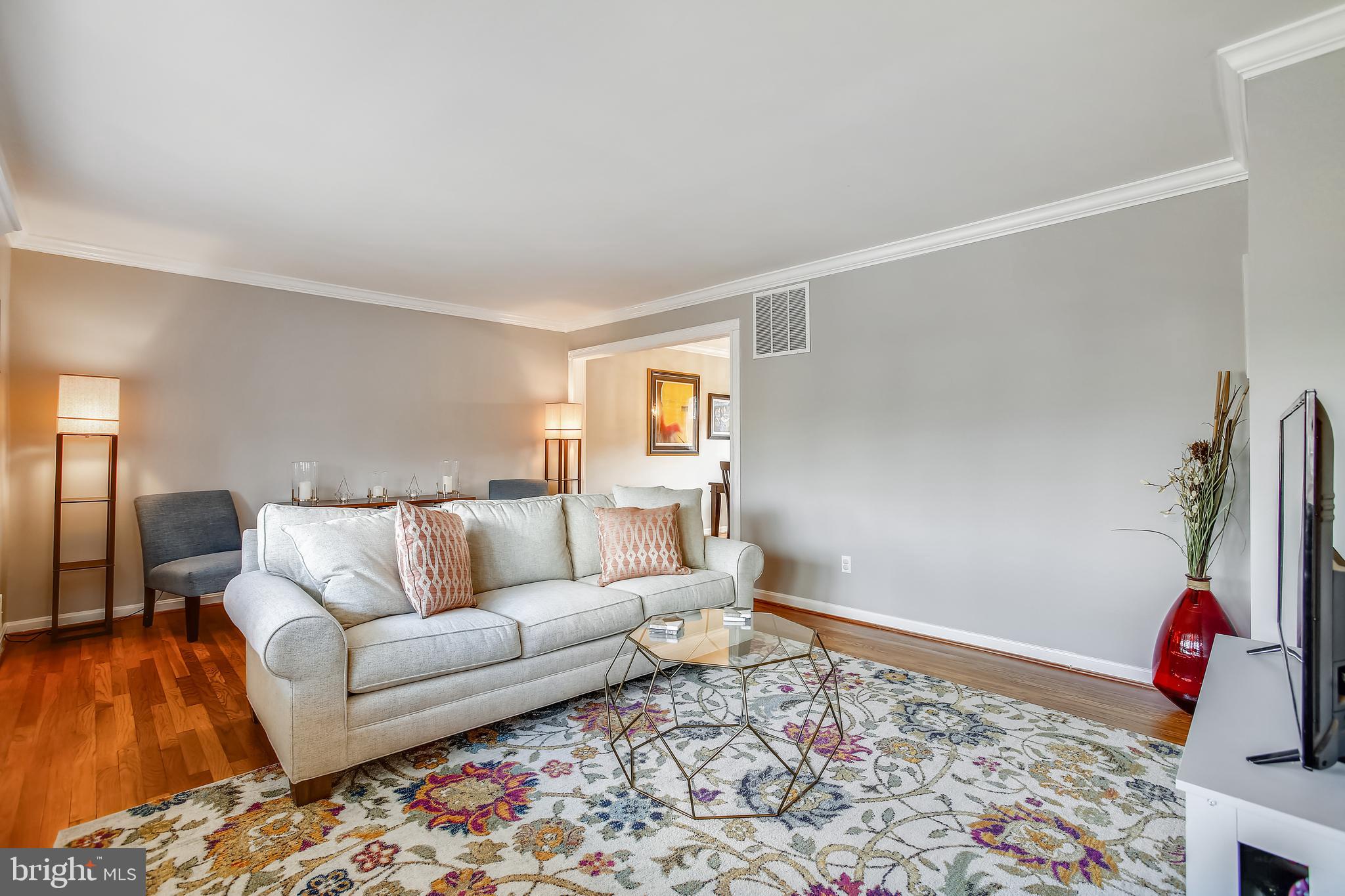 6005 Filbert Court Springfield, VA 22152 - Photo 12 of 55 a living room with furniture and a rug