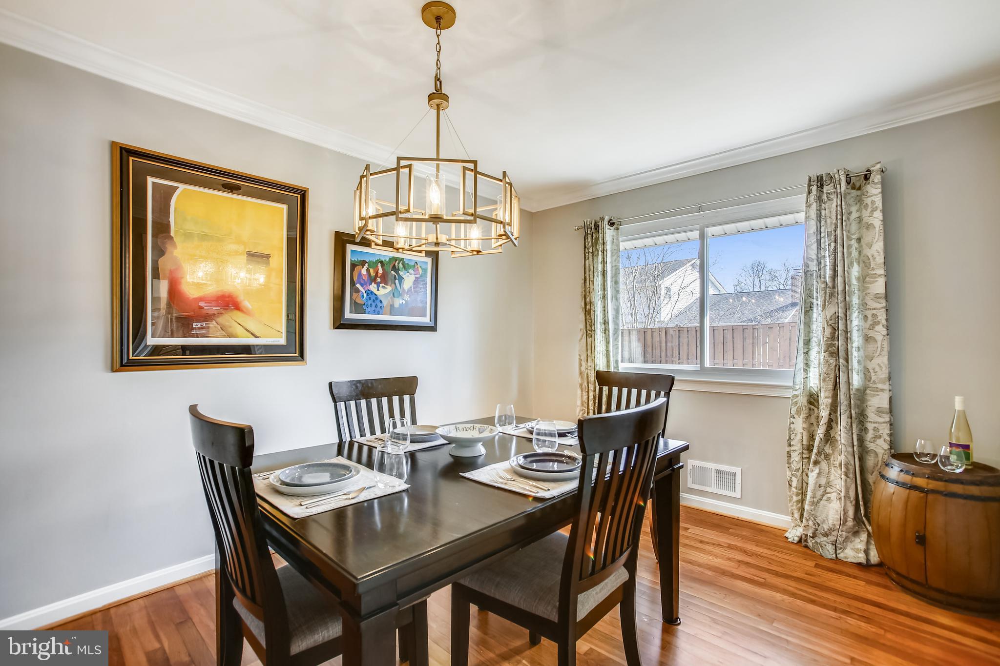 6005 Filbert Court Springfield, VA 22152 - Photo 16 of 55 a view of a dining room with furniture wooden floor and chandelier