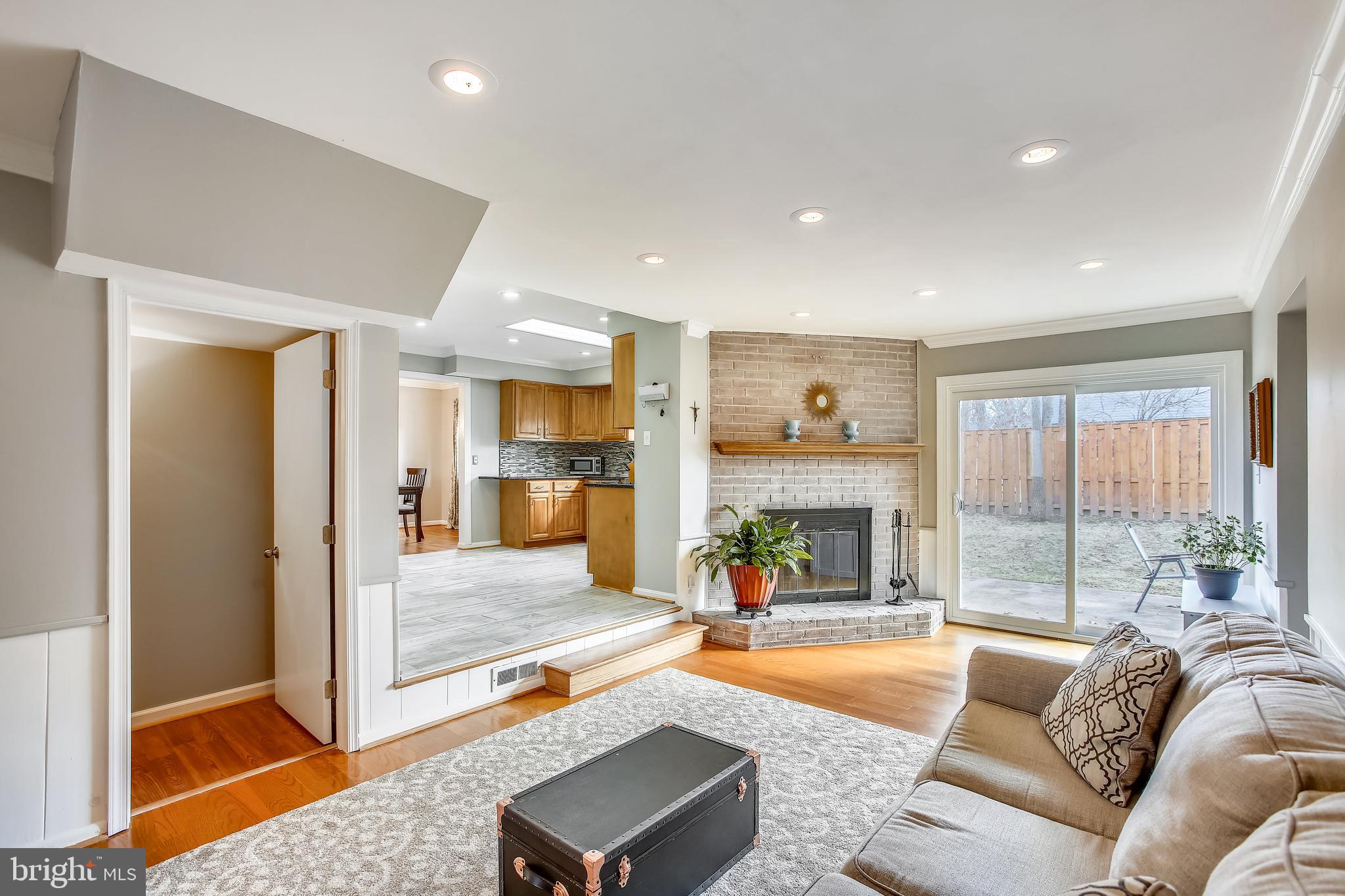 6005 Filbert Court Springfield, VA 22152 - Photo 22 of 55 a living room with furniture pool table and glass door