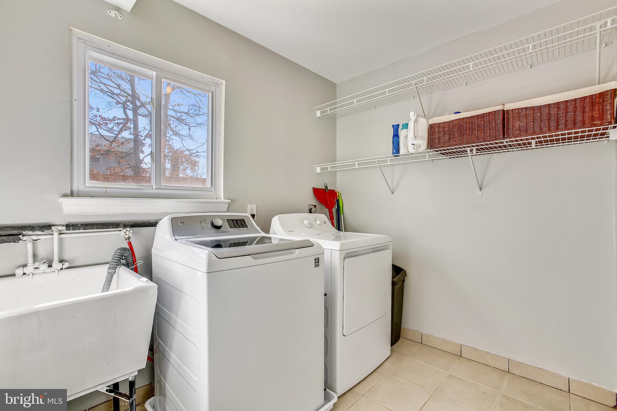 6005 Filbert Court Springfield, VA 22152 - Photo 28 of 55 a utility room with dryer and washer