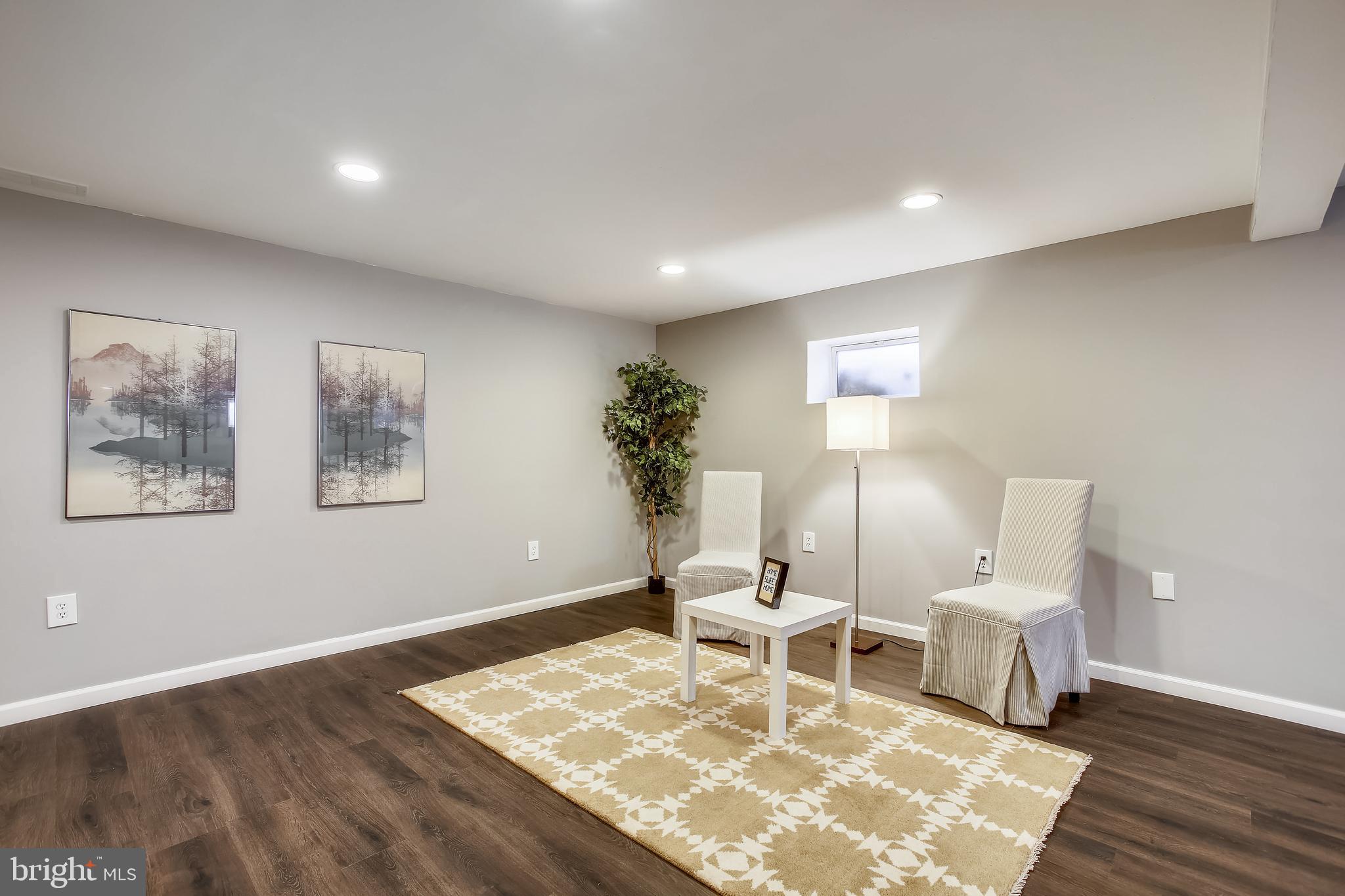 6005 Filbert Court Springfield, VA 22152 - Photo 45 of 55 a living room with a couch and a rug
