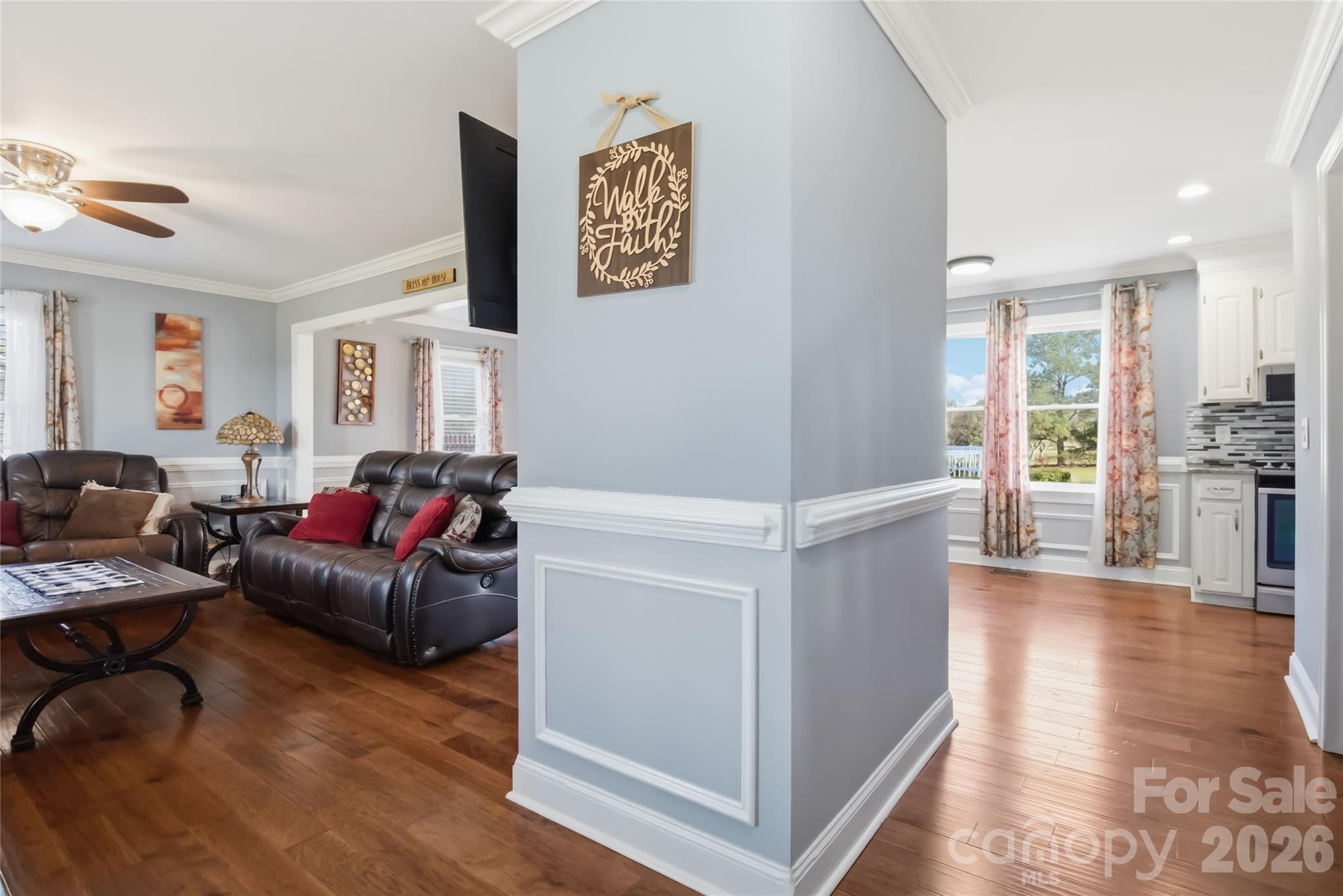 509 Baucom Deese Road Monroe, NC 28110 - Photo 8 of 42 a living room with furniture and a wooden floor