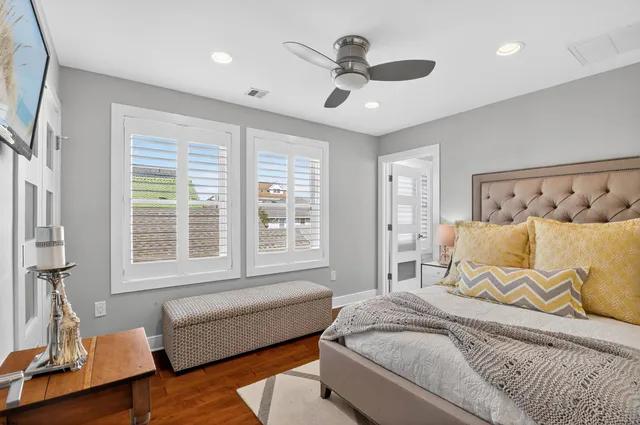 a bedroom with furniture and a bed