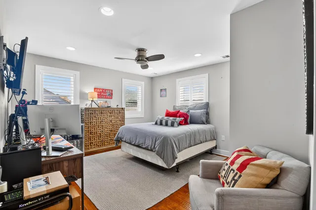 a bedroom with furniture and a bed