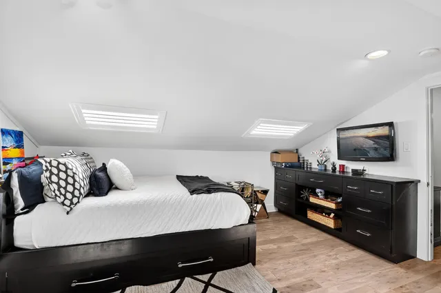 a view of a balcony with chairs