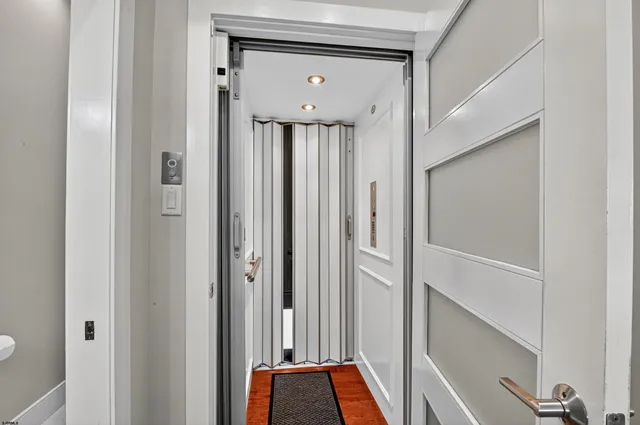 a view of an outdoor space with furniture and umbrella