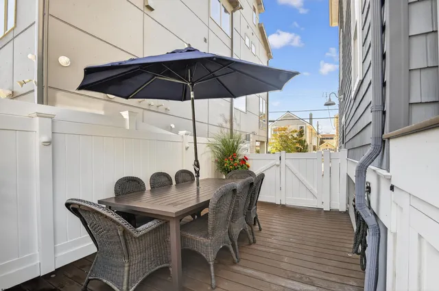 a view of a swimming pool and an outdoor space