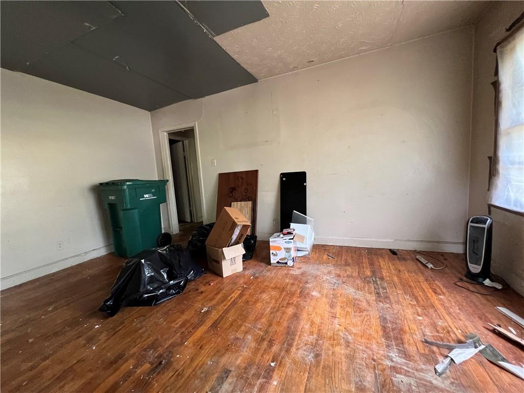 3 Kent Court Columbus, GA 31903 - Photo 6 of 10 a bedroom with furniture and a flat screen tv