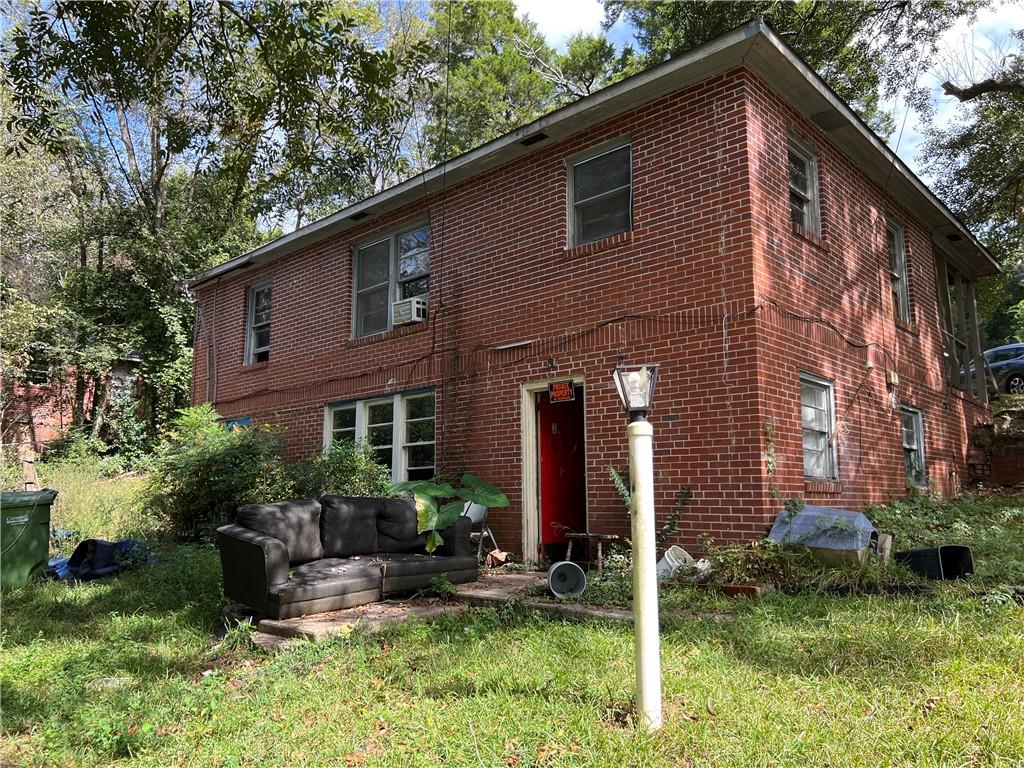3 Kent Court Columbus, GA 31903 - Photo 10 of 10 a backyard of a house with seating space