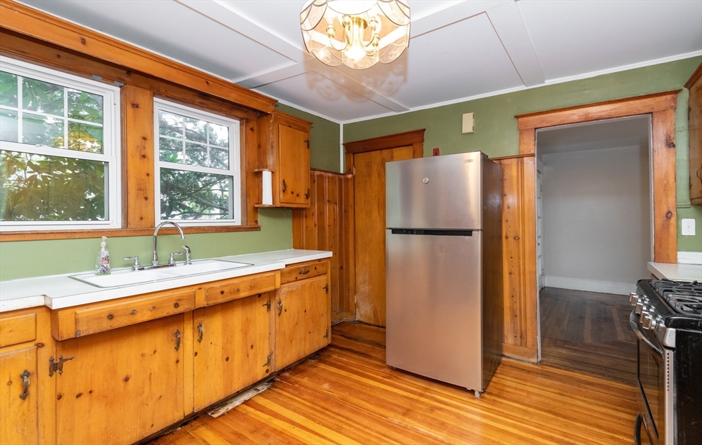 8 Newcomb Avenue Saugus, MA 01906 - Photo 16 of 37 a kitchen with a refrigerator and a sink