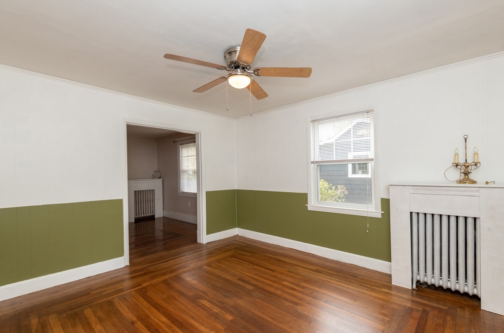 8 Newcomb Avenue Saugus, MA 01906 - Photo 27 of 37 wooden floor in an empty room with a window and wooden floor