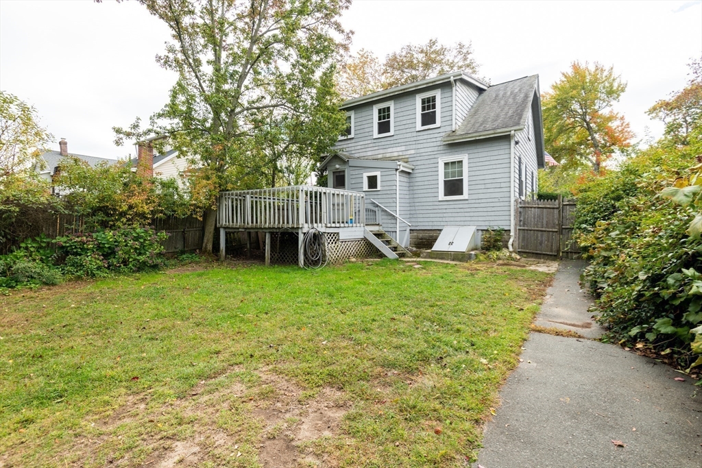 8 Newcomb Avenue Saugus, MA 01906 - Photo 28 of 37 a front view of a house with garden
