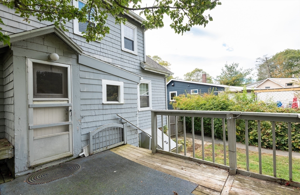 8 Newcomb Avenue Saugus, MA 01906 - Photo 29 of 37 a view of a balcony with a tree