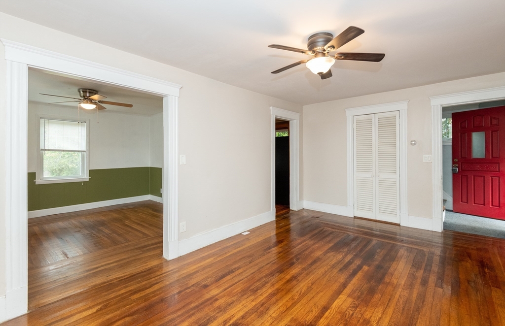 8 Newcomb Avenue Saugus, MA 01906 - Photo 7 of 37 wooden floor in an empty room with a window