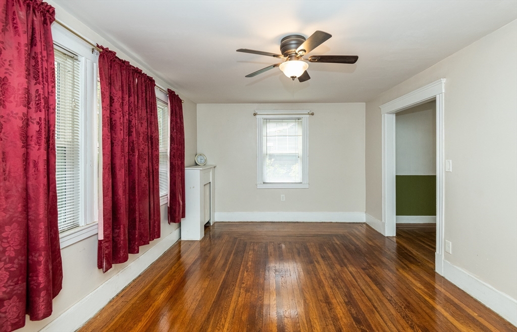 8 Newcomb Avenue Saugus, MA 01906 - Photo 10 of 37 wooden floor in an empty room with a window