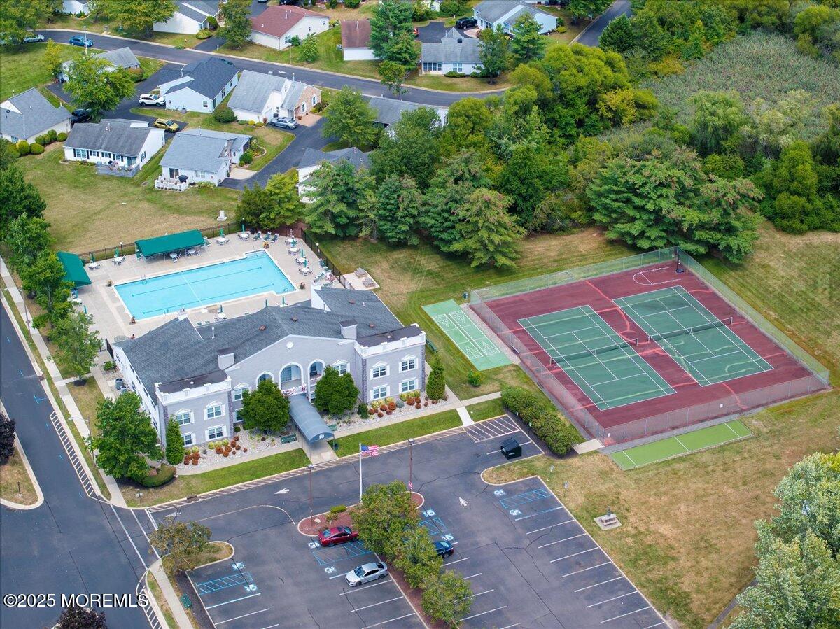 5 Jaffreyton Close Freehold, NJ 07728 - Photo 13 of 39 an aerial view of a tennis ground and a cars park