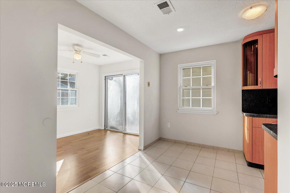 5 Jaffreyton Close Freehold, NJ 07728 - Photo 22 of 39 an empty room with windows and wardrobe
