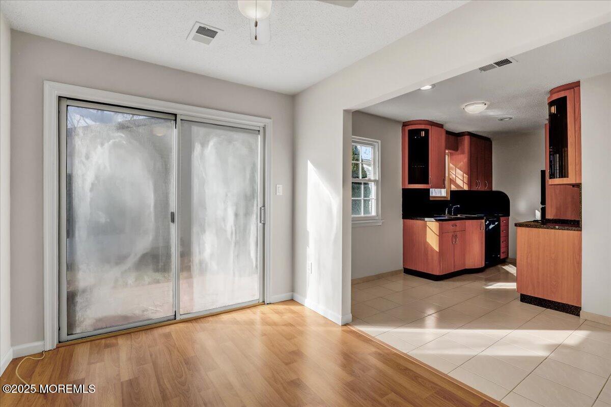 5 Jaffreyton Close Freehold, NJ 07728 - Photo 29 of 39 a view of a hallway with a living room
