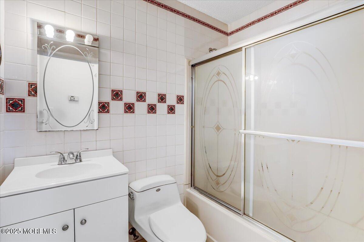 5 Jaffreyton Close Freehold, NJ 07728 - Photo 39 of 39 a bathroom with a sink toilet and shower