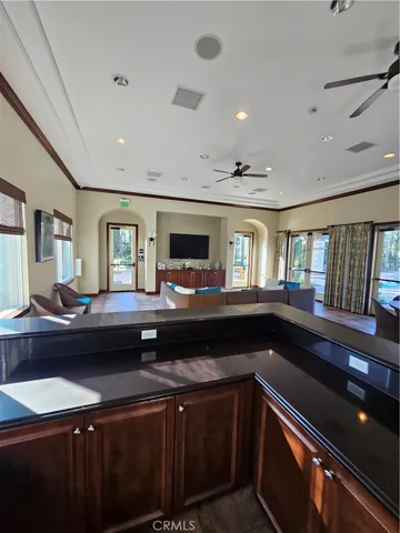 a kitchen with a sink appliances and a window