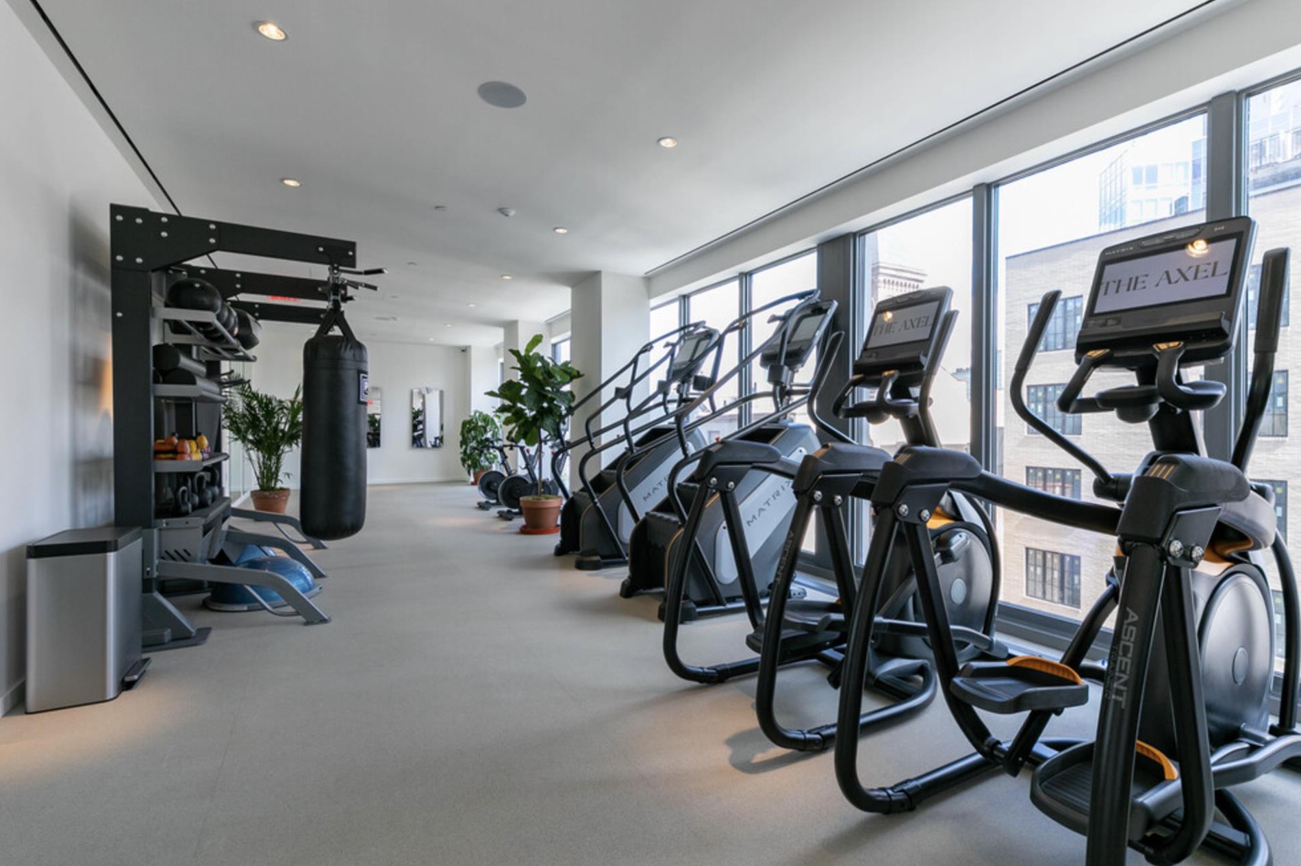 545 Vanderbilt Avenue, Unit PH1J Brooklyn, NY 11238 - Photo 10 of 11 a view of a room with gym equipment