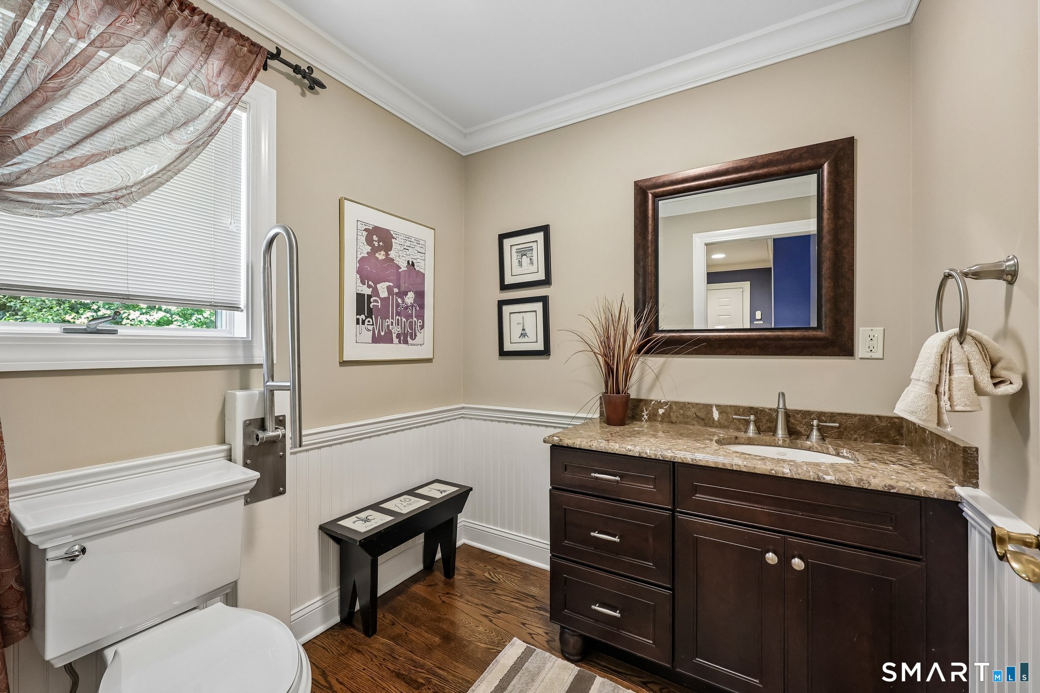 72 Strawberry Hill Road Madison, CT 06443 - Photo 19 of 40 There are two half baths and two full baths in this home. Travertine countertop, beadboard wainscotting and crown molding add a special touch to this bathroom