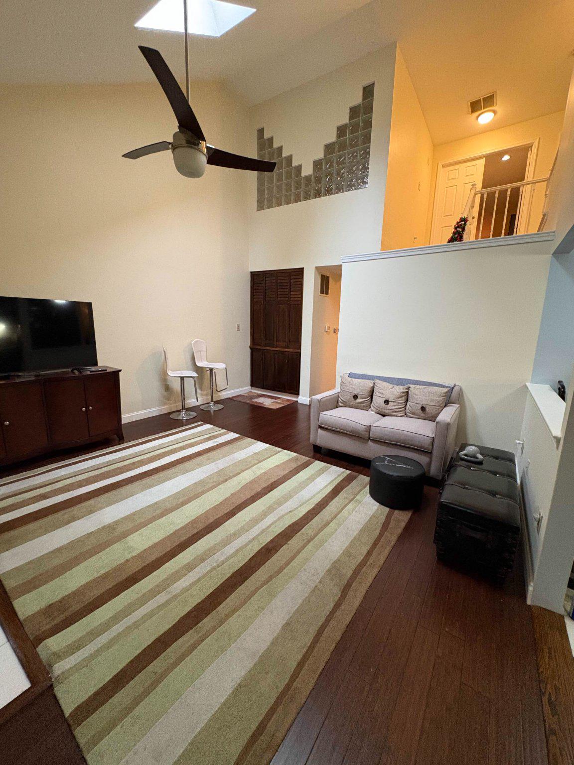 5 Corlen Court, Unit 5 Medford, NJ 08055 - Photo 11 of 33 a bedroom with bed and a chandelier
