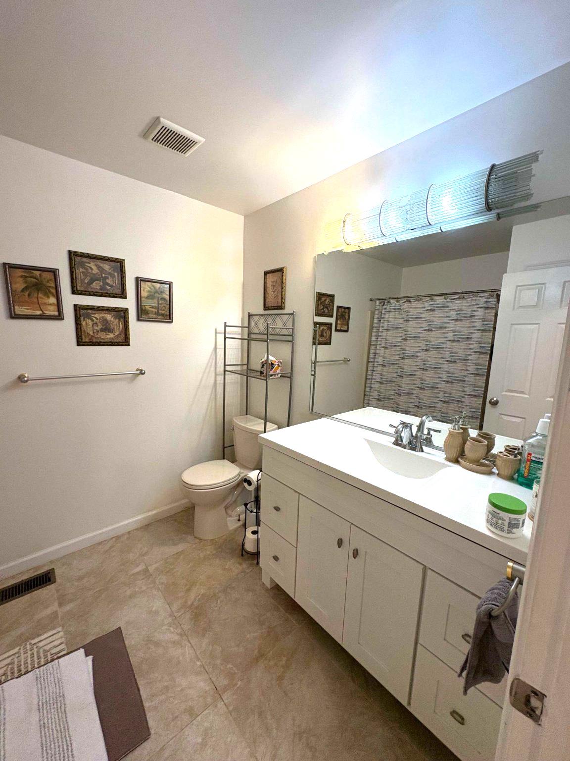 5 Corlen Court, Unit 5 Medford, NJ 08055 - Photo 26 of 33 a bathroom with a toilet sink and mirror