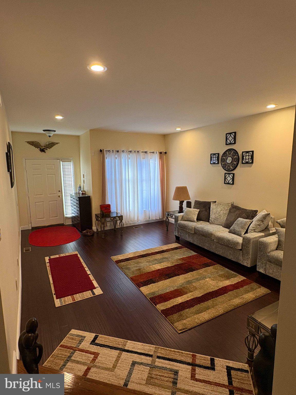 5 Corlen Court, Unit 5 Medford, NJ 08055 - Photo 5 of 33 a living room with furniture and a table
