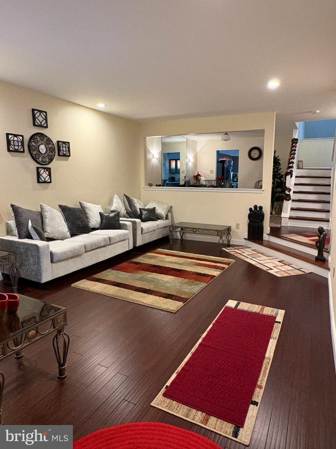 5 Corlen Court, Unit 5 Medford, NJ 08055 - Photo 6 of 33 a living room with furniture and wooden floor