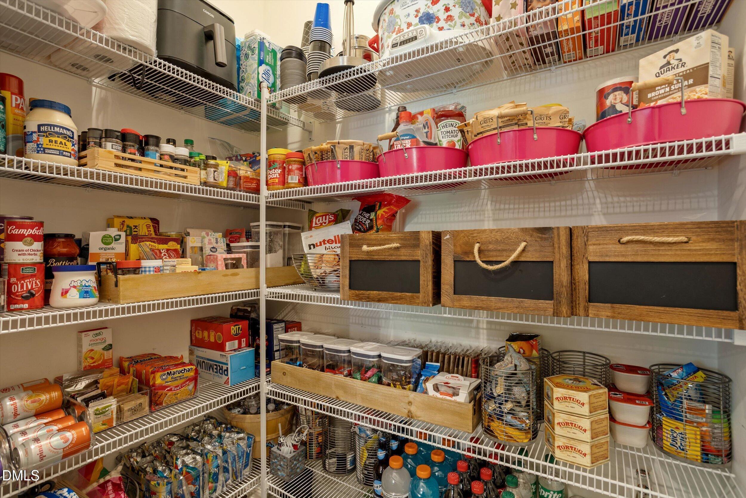 113 Raccoon Path Holly Springs, NC 27540 - Photo 14 of 28 113 Raccoon Path Oversized Pantry