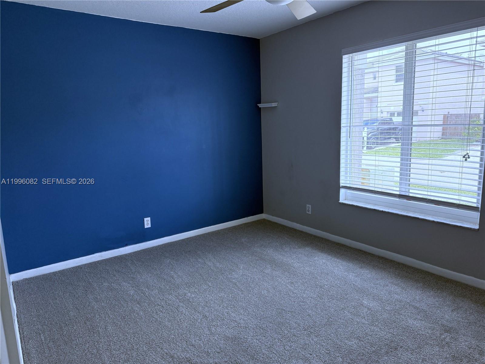 3091 Lighthouse Place Margate, FL 33063 - Photo 26 of 38 an empty room with a window